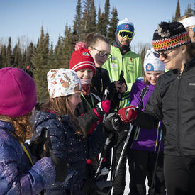 The Governor General fist bumps a young girl in Thunder Bay.