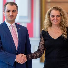 The Governor General shakes hands with the Ambassador-designate of the Republic of Kosovo.