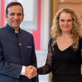 The Governor General shakes hands with the High Commissioner-designate for the Republic of India.