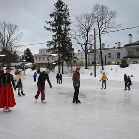 Members of the diplomatic corps skate at the Rideau Hall rink.