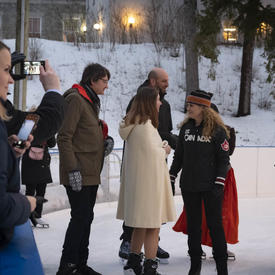 A photo of the Governor General meeting with members of the Diplomatic Corps at the Rideau Hall skating rink.