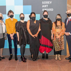 Their Excellencies on either side of the row of finalists for the 2021 Sobey Art Award.