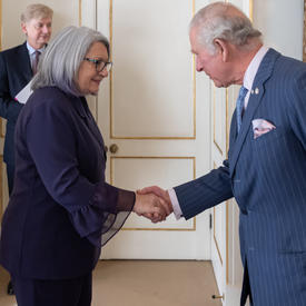 Governor General Mary May Simon is shaking hands with  His Royal Highness The Prince of Wales.