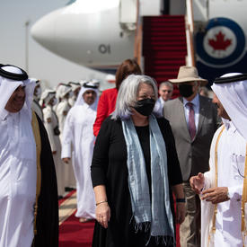 Governor General Mary Simon is being greeted on the tarmac in Qatar.