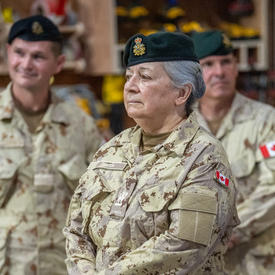The Governor General is dressed in a military uniform.