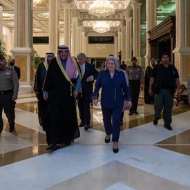 The Governor General is walking next to His Highness Sheikh Sabah Khaled Al-Hamad Al-Sabah, Prime Minister of Kuwait.