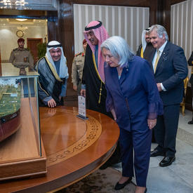 The Governor General is looking at a display alongside His Highness Sheikh Sabah Khaled Al-Hamad Al-Sabah, Prime Minister of Kuwait.
