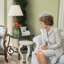 The Governor General is sitting across from Her Royal Highness Princess Margriet of the Netherlands inside Rideau Hall.
