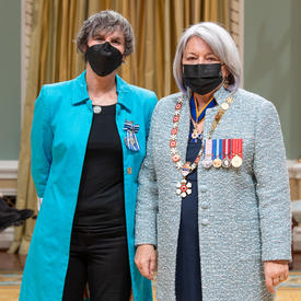 Nicole Rycroft standing next to the governor general.
