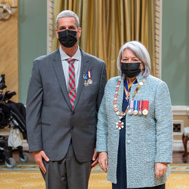 Joseph Michael Roberts standing next to the governor general.