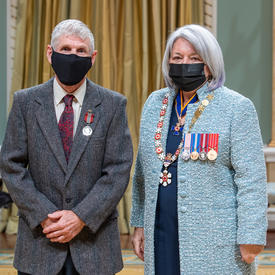 John Christopher Bryant standing next to the governor general.