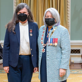 Catherine Elizabeth Thorn standing next to the governor general.