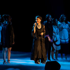 Susan Aglukark singing with two Inuit choirs.