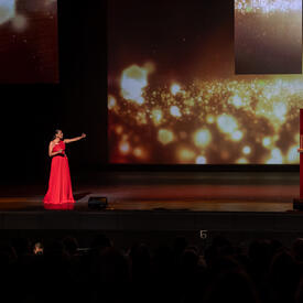 Isabelle Racicot, Host and Daniel Parent, co-Host, on stage.