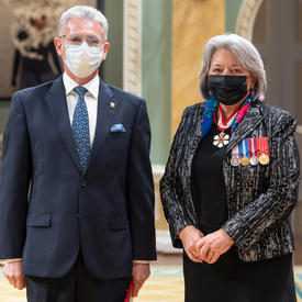 His Excellency Carlos Alberto Patricio Játiva Naranjo, Ambassador of the Republic of Ecuador, stands next to Her Excellency.