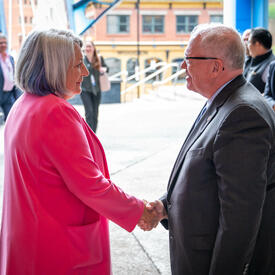 Her Excellency is shaking hands with the Honourable Georges Furey, Speaker of the Senate of Canada.