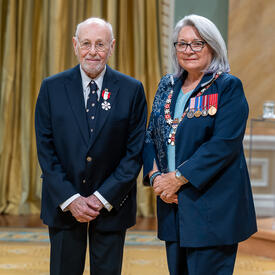 Jacques Légaré is standing next to the Governor General.