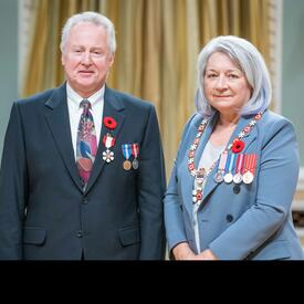 Paul C. LaBarge is standing next to the Governor General.