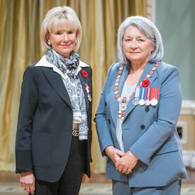 Donna M. Slaight is standing next to the Governor General.