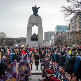View of the crowd assembled for the Remembrance Day ceremony at the National War Memorial in Ottawa. 