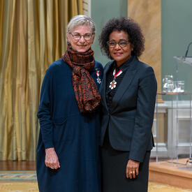 Ella Yoelli Amir is standing next to The Right Honourable Michaëlle Jean.