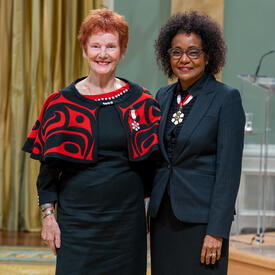 Diane Elaine Clement is standing next to The Right Honourable Michaëlle Jean.