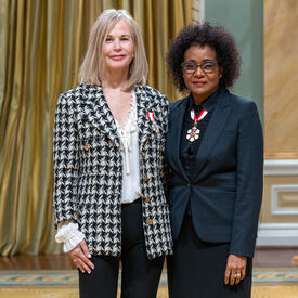 Mary Eberle Deacon is standing next to The Right Honourable Michaëlle Jean.