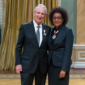 Eric D. Friesen is standing next to The Right Honourable Michaëlle Jean.