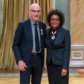 Ken Greenberg is standing next to The Right Honourable Michaëlle Jean.