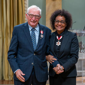 Jean-Marie Toulouse is standing next to The Right Honourable Michaëlle Jean.