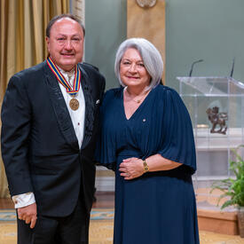 Governor General Marie Simon presents John Kim Bell with his Governor General’s Performing Arts Awards