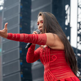 A singer sings during the Canada Day celebration