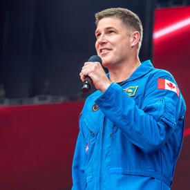 Colonel Jeremy Hansen delivers a speech during the Canada Day celebration