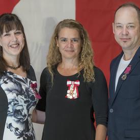 Dr. Angela Irvine and Cole Marshall received Medals of Bravery.  They rescued Dr. Irvine’s young sons who were in danger of drowning in the South Saskatchewan River, in Medicine Hat, Alberta. 
