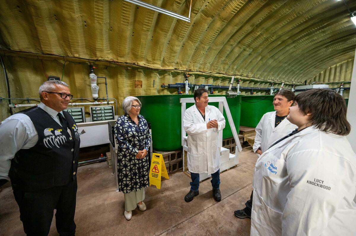 The Governor General speaks with members of the Abegweit Biodiversity Enhancement Hatchery