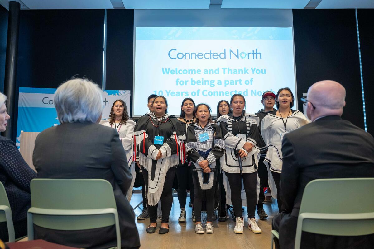 Governor General Mary Simon sits during the welcome by Connected North