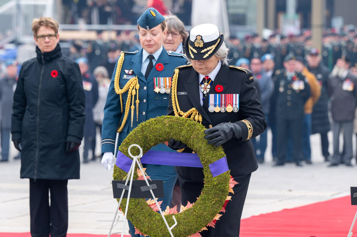 Governor General Mary Simon lays a wreath during the ceremony