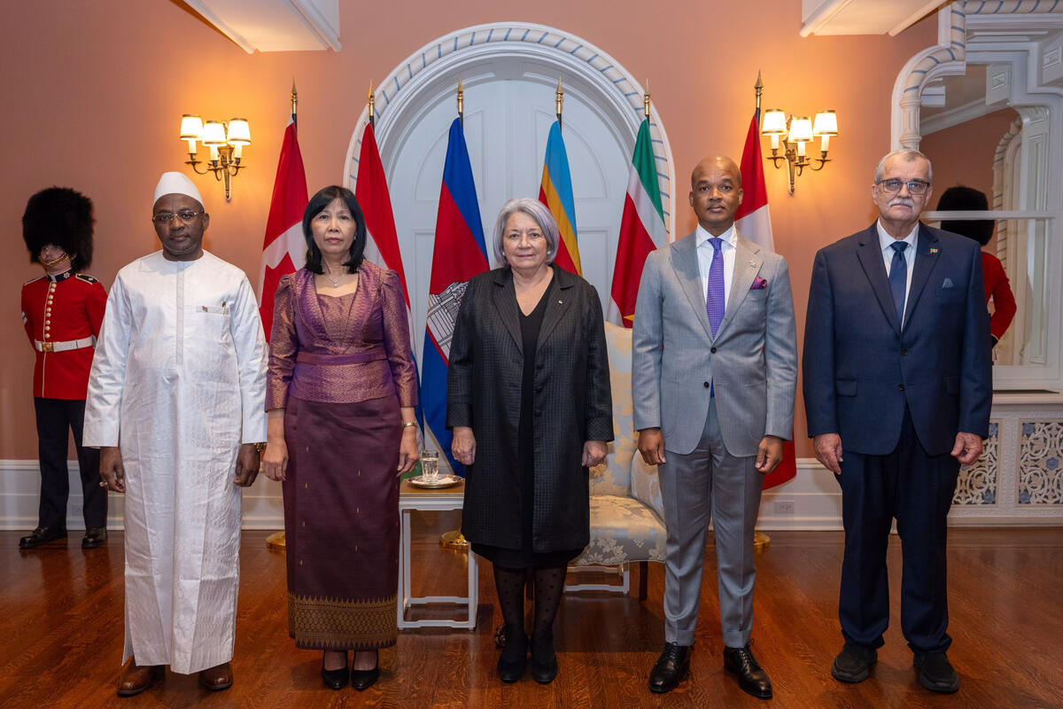 Governor General Mary Simon stands with the new Heads of Mission