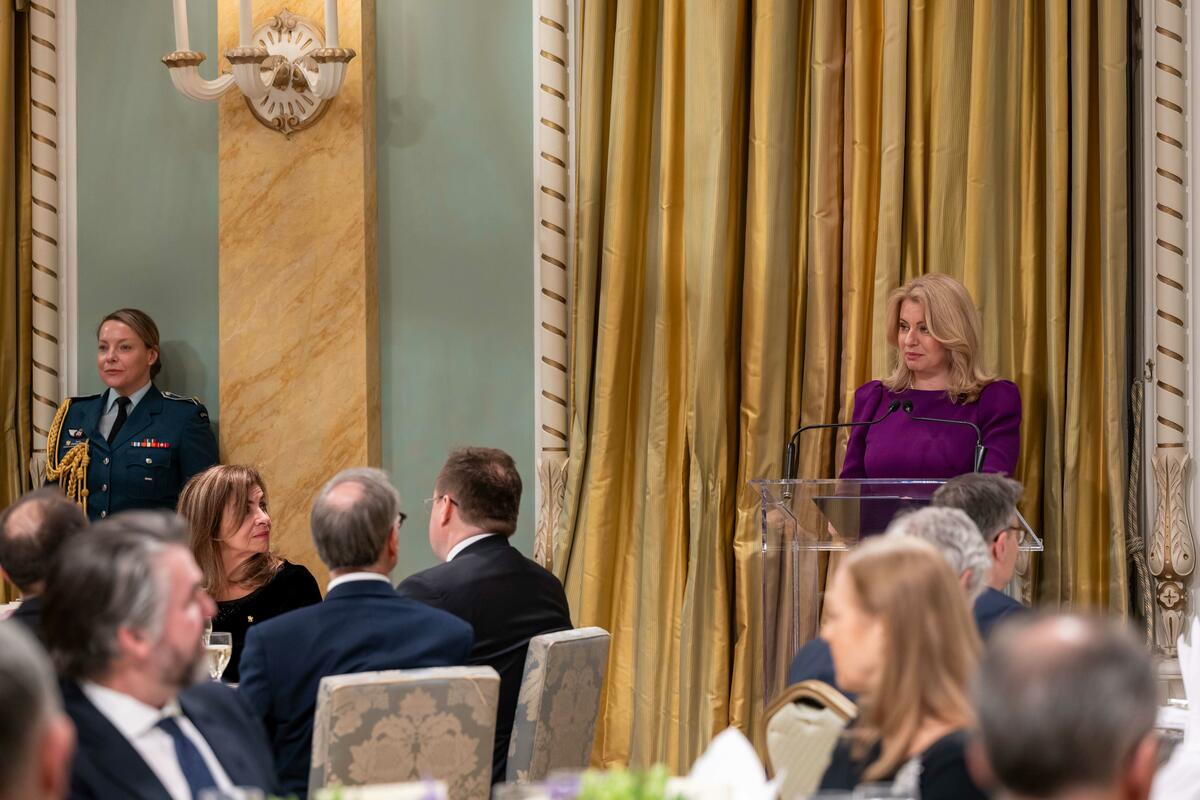 President Čaputová delivers her remarks at a podium in the Ballroom