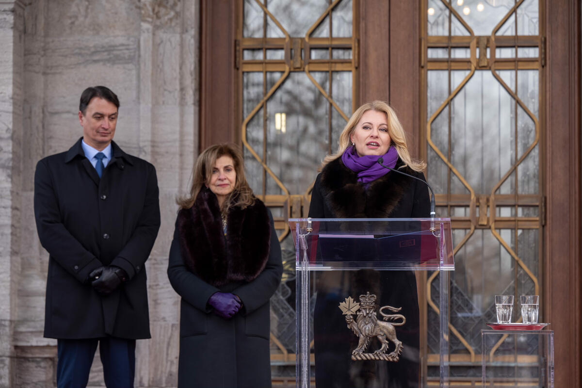 President Čaputová gives her remarks standing next to Justice Karakatsanis and Mr. Rizman