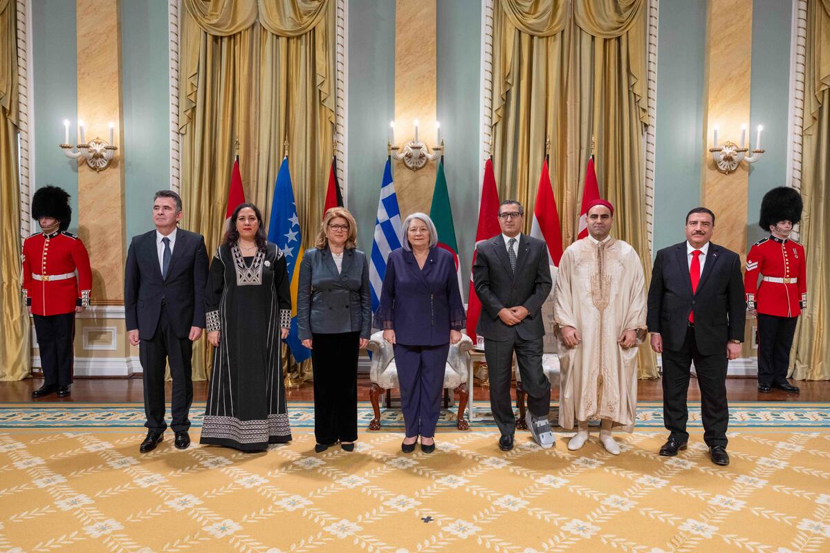 Governor General Mary Simon stands with the new Heads of Mission