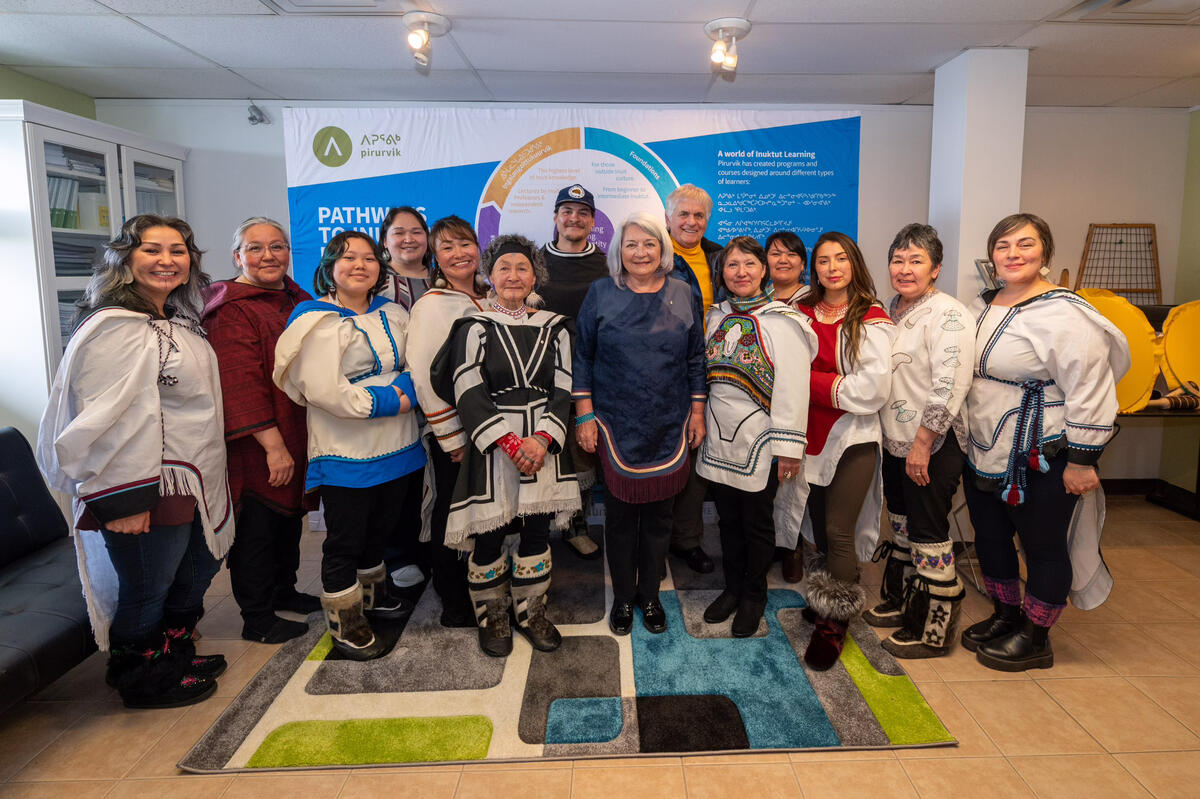Governor General Mary Simon stands with members of the Pirurvik Centre
