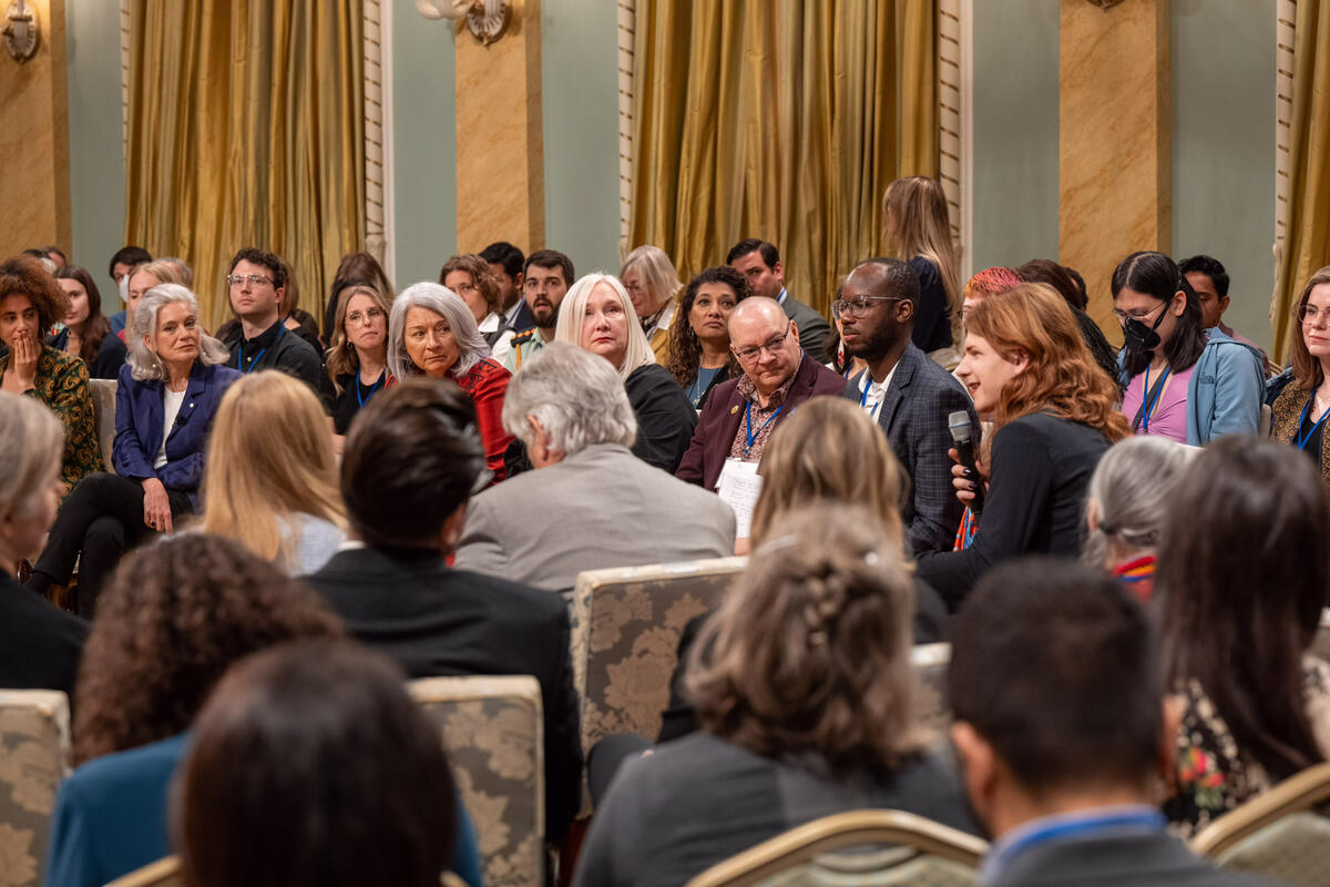 Fae Johnstone speaks during the syposium