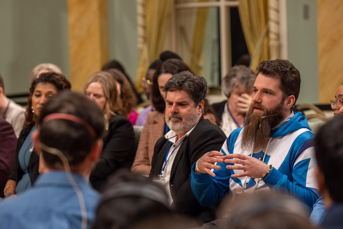 François Savard speaks during the symposium