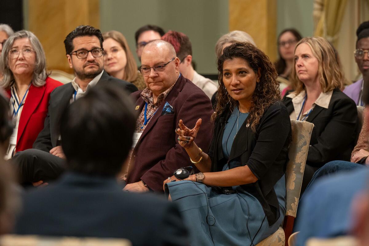 Anila Umar speaks during the symposium
