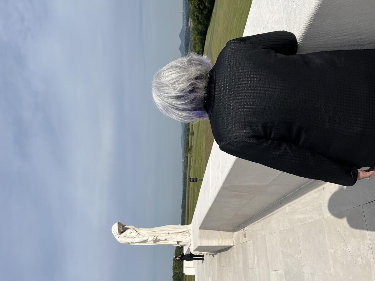 Governor General Mary Simon looking over the horizon at Vimy Ridge.