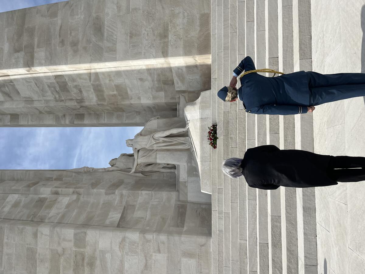 Governor General Mary Simon and her aide de camp stand before the Vimy Ridge Memorial.