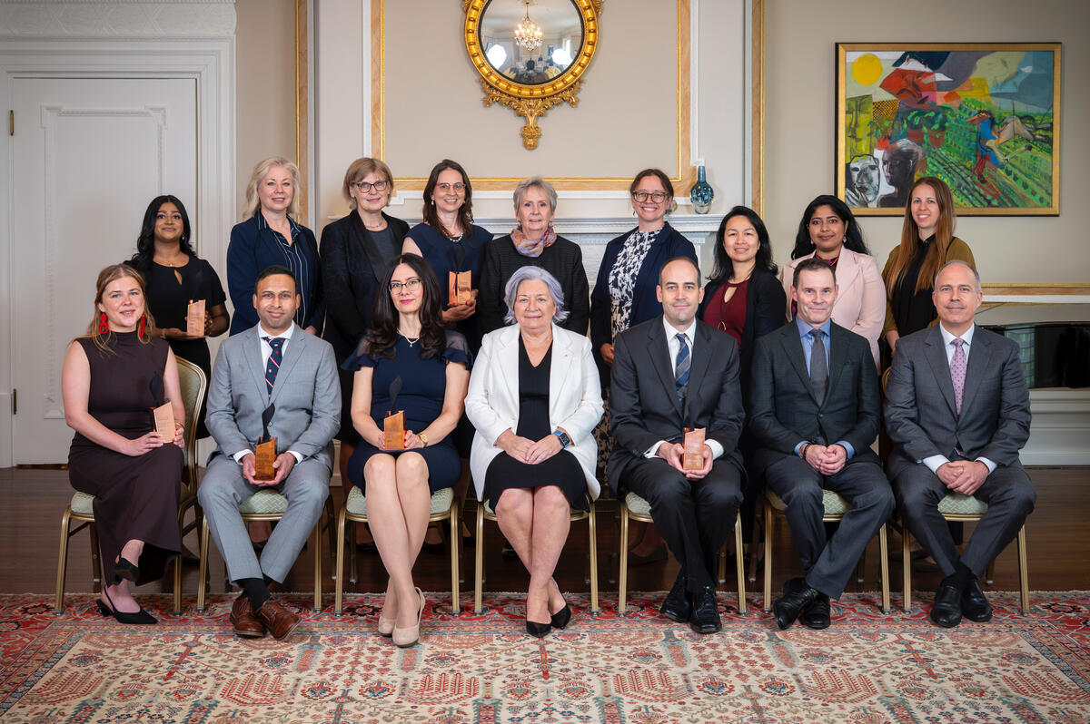 Governor General Mary Simon posing for a photo with award recipients.