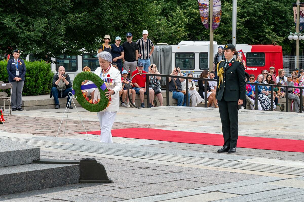 Governor General Mary Simon laying a wreath at the National War Memorial.