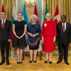 Governor General Marie Simon stands with the new Heads of Mission in the ballroom of Rideau Hall.